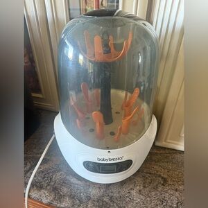 Baby Brezza Bottle Sterilizer in White and Orange